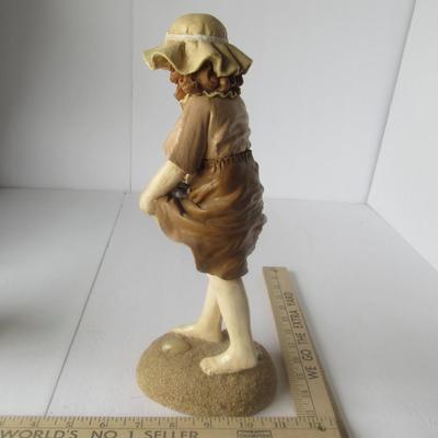Cute Figurine of Girl at the Beach Gathering Shells