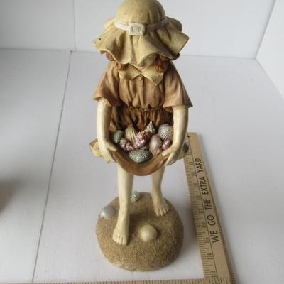 Cute Figurine of Girl at the Beach Gathering Shells