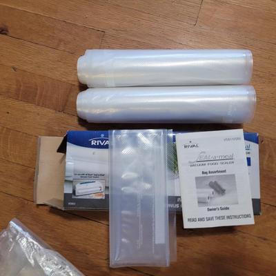 New Sealâ€¢aâ€¢Meal Vacuum food sealer w/additional bags and cannisters