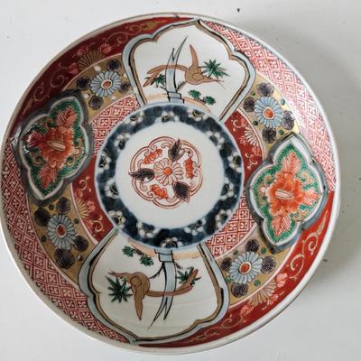 Sale Photo Thumbnail #21: Late 1800s or potentially Early 1900s, suspected 1800s hand painted ceramic plate with floral motifs