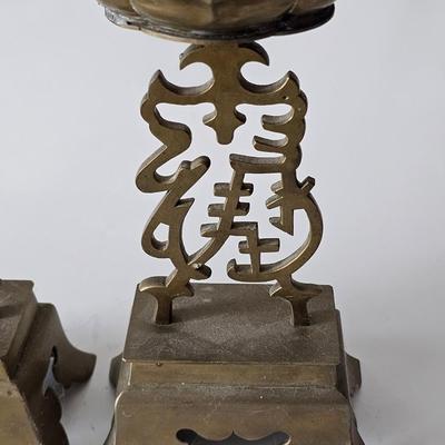 Sale Photo Thumbnail #286: heavy brass candlesticks with asian characters in them, see photos for details. Heavy to ship.