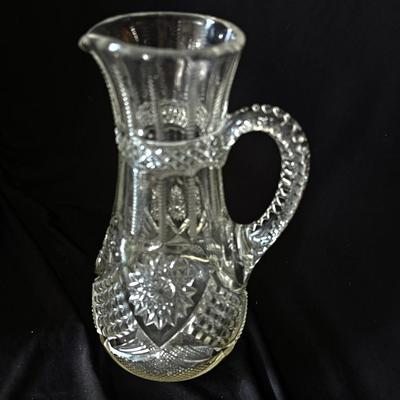 Sale Photo Thumbnail #369: great condition, spiral handle with star pattern on both faces, pressed glass not cut crystal as far as I can tell, please correct me if wrong