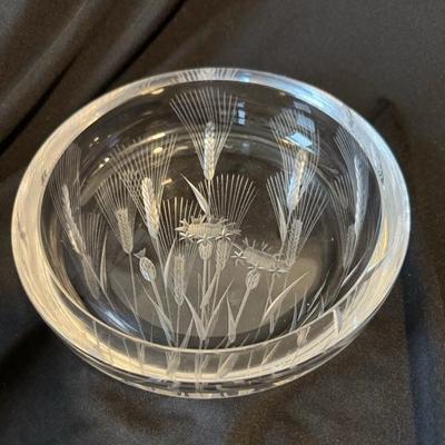 Sale Photo Thumbnail #556: This is a rare elegant Bohemia Crystal dish in the style of Josef Svarc. The dish has an amazing thistle pattern with some etching to highlight the beautiful botanical motif. It is a large circular dish measuring 6" in diameter and is very heavy. It is in