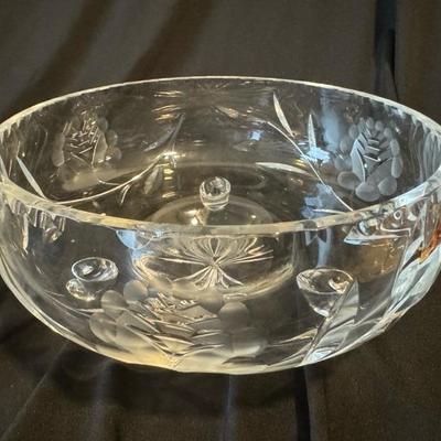 Sale Photo Thumbnail #560: German or potentially Bohemian lead crystal with no sticker or signature, cut and etched crystal bowl serves as a large centerpiece. Has an occluded edge see photos. Large centerpiece would be perfect for fruit, candies, flowers, weddings 