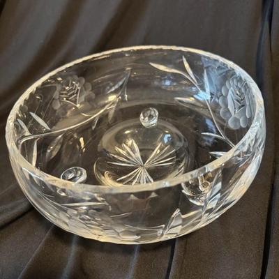Sale Photo Thumbnail #559: German or potentially Bohemian lead crystal with no sticker or signature, cut and etched crystal bowl serves as a large centerpiece. Has an occluded edge see photos. Large centerpiece would be perfect for fruit, candies, flowers, weddings 