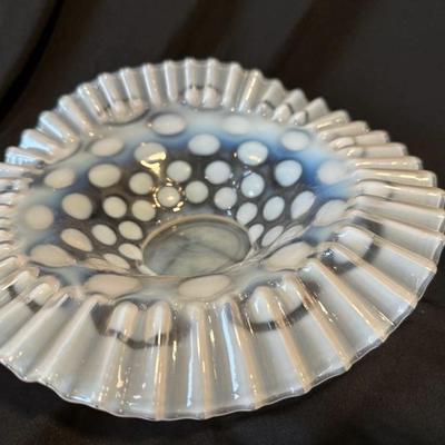 Sale Photo Thumbnail #808: This beautiful scalloped bowl is roughly 9 to 10 inches depending on where you measure it and features the iconic coin dot pattern with a ruffled edge in immaculate condition. There is no stamp or other signature on this vintage piece.