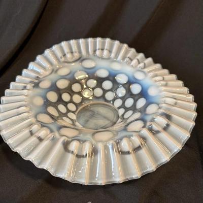 Sale Photo Thumbnail #809: This beautiful scalloped bowl is roughly 9 to 10 inches depending on where you measure it and features the iconic coin dot pattern with a ruffled edge in immaculate condition. There is no stamp or other signature on this vintage piece.