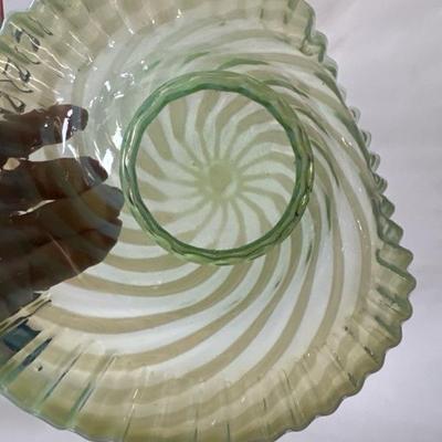 Sale Photo Thumbnail #863: This is a beautiful original Fenton ruffled bowl and perfect condition, lime green. The foot shows that spiral optic pattern and the ruffles are gorgeous with a lifted side.