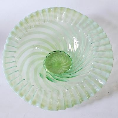 Sale Photo Thumbnail #865: This is a beautiful original Fenton ruffled bowl and perfect condition, lime green. The foot shows that spiral optic pattern and the ruffles are gorgeous with a lifted side.