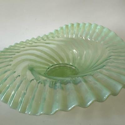 Sale Photo Thumbnail #864: This is a beautiful original Fenton ruffled bowl and perfect condition, lime green. The foot shows that spiral optic pattern and the ruffles are gorgeous with a lifted side.