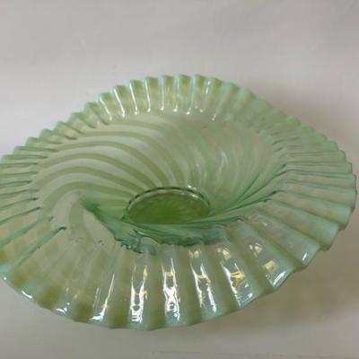 Sale Photo Thumbnail #862: This is a beautiful original Fenton ruffled bowl and perfect condition, lime green. The foot shows that spiral optic pattern and the ruffles are gorgeous with a lifted side.