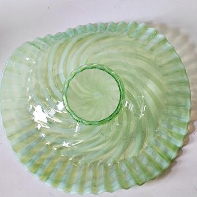 Sale Photo Thumbnail #866: This is a beautiful original Fenton ruffled bowl and perfect condition, lime green. The foot shows that spiral optic pattern and the ruffles are gorgeous with a lifted side.