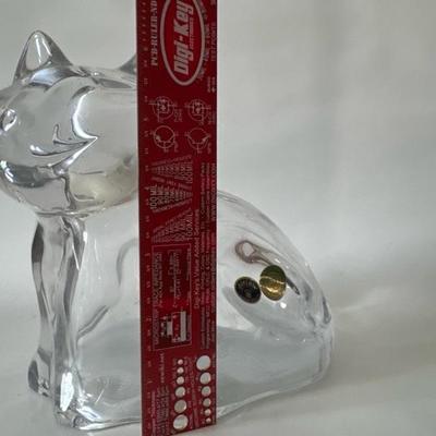 Sale Photo Thumbnail #870: This Bohemian Crystal cat bank stands just shy of 7 inches tall and is 7 1/2 inches long. It has an open a bowl plastic base and serves as a bank for saving your money. ï¿¼Used only once for a fundraiser.
ï¿¼
Vintage stickers look to be from the lat