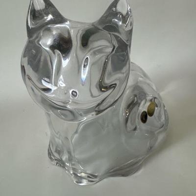 Sale Photo Thumbnail #869: This Bohemian Crystal cat bank stands just shy of 7 inches tall and is 7 1/2 inches long. It has an open a bowl plastic base and serves as a bank for saving your money. ï¿¼Used only once for a fundraiser.
ï¿¼
Vintage stickers look to be from the lat