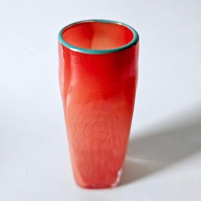 Sale Photo Thumbnail #882: A pop of color, very unique and beautiful orange vase stands approx 7 inches tall