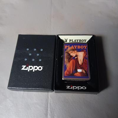 NIB ZIPPO LIGHTER WITH PLAYBOY FROM FEBRUARY 1986