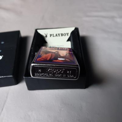 NIB ZIPPO LIGHTER WITH PLAYBOY FROM FEBRUARY 1986