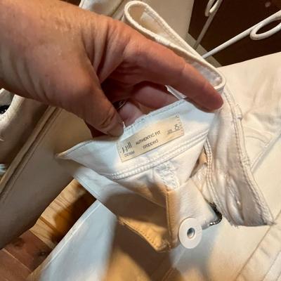 Lot of white canvas jeans