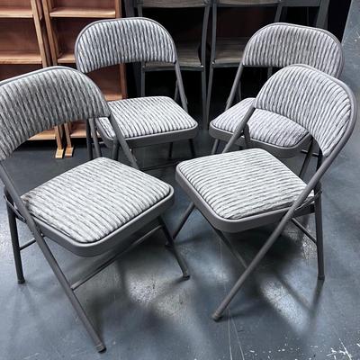 4 Folding Chairs with a padded seat 