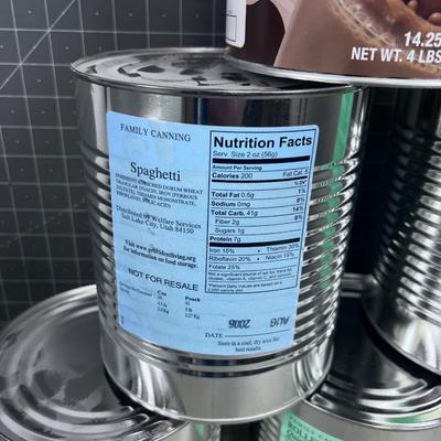 (6) No. 10 Can FOOD STORAGE Oats, Spaghetti and CHOCOLATE MILK 