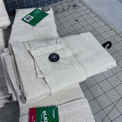 8 Packages of BISTRO NAPKINS Comes with a TOTE with Gold Thread. 32 total