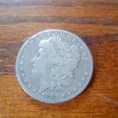 LOT 35 OLD SILVER DOLLAR