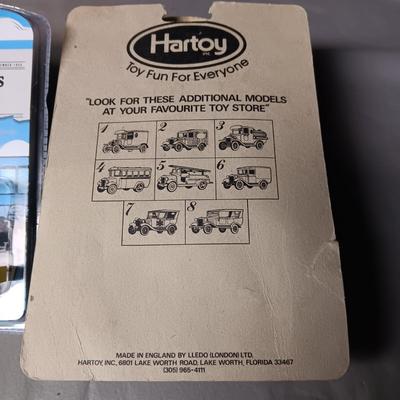 2 NIB 1955 CHEVROLET BEL AIR AND A FORD TRI-STATE DEALER WAGON TOYS