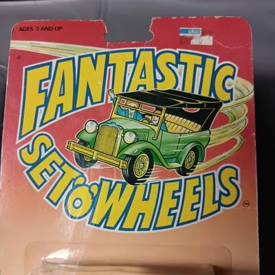 2 NIB 1955 CHEVROLET BEL AIR AND A FORD TRI-STATE DEALER WAGON TOYS
