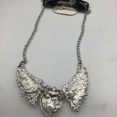 Wings with heart statement necklace
