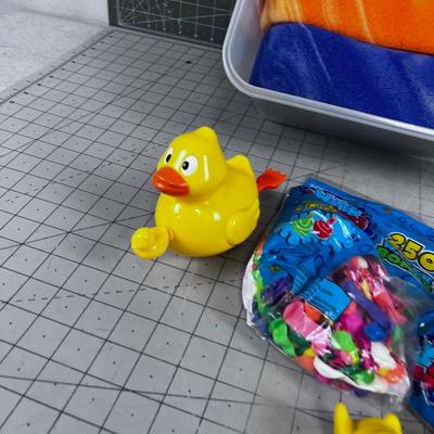 Tub of Bath Toys and Water Balloons (Not for Toddlers!) 