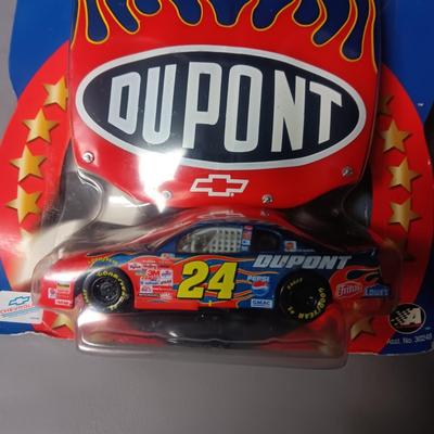 NASCAR WINNER'S CIRCLE RACE HOOD AND TINY DIE CAST REPLICA