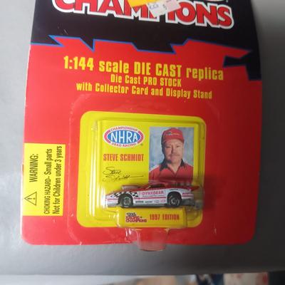 NASCAR WINNER'S CIRCLE RACE HOOD AND TINY DIE CAST REPLICA