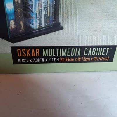 Oskar Multimedia cabinet new in box - Holds 72 DVD or 156 CD's - Needs assembly.