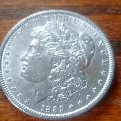 LOT 55 1889 SILVER DOLLAR