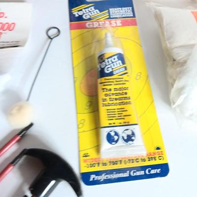 Gun cleaning items - chemicals - grease - cleaning rod and pads