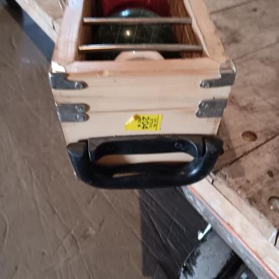 BOCCE BALL WITH A WOODEN STORAGE CASE ON WHEELS