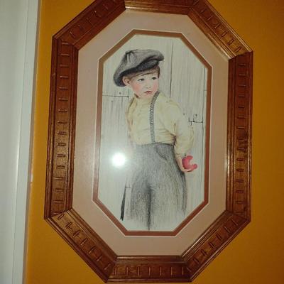 Pair of Framed Prints Boy and Girl Dressed in Vintage Clothing