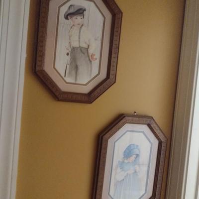 Pair of Framed Prints Boy and Girl Dressed in Vintage Clothing