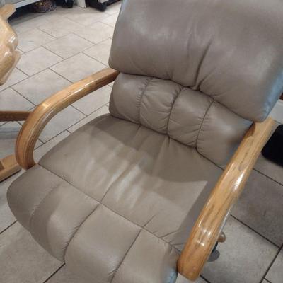 Solid Oak Octagonal Dining Table with Four Upholstered Rolling Chairs includes One Leaf Insert