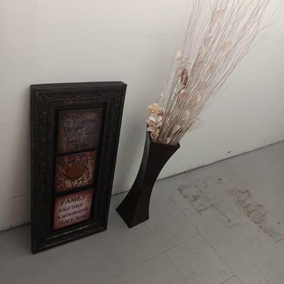 METAL WALL HANGING WITH WORDS AND A TALL TIN VASE WITH FAUX FOLIAGE