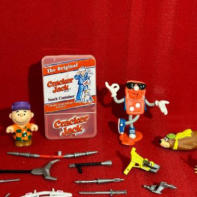 CRACKER JACK CONTAINER, CHARLIE BROWN FIGURES, DONNY DOMINO, YOGI BEAR ARBYS KIDS MEAL TOY, DIGIMON IMPERIAL DRAMON DRAGON AND A&W ROOTY...