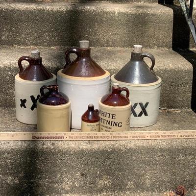 LOT 66: Large Collection of Brown Top Crock Jugs