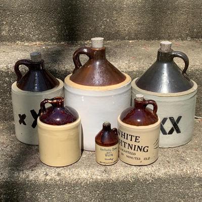 LOT 66: Large Collection of Brown Top Crock Jugs