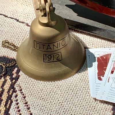LOT 73: Titantic Memorabilia Including an Oar, Life Preserver, Model Ship, Blank, Bell, Assorted Ephemera and More