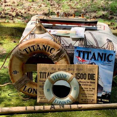 LOT 73: Titantic Memorabilia Including an Oar, Life Preserver, Model Ship, Blank, Bell, Assorted Ephemera and More