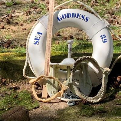 LOT 74: Anchors Away - Sea Goddess Trump Marina Life Preserver, 15lb Anchor and Shark Teeths