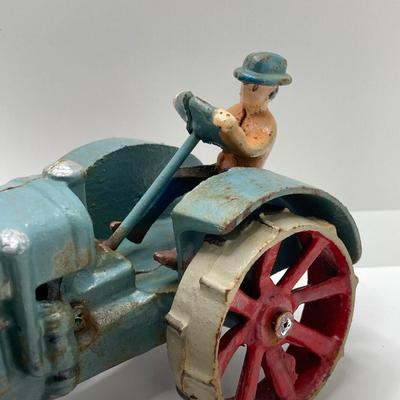 LOT 90: Cast Iron Toy Tractors - McCormic Deering and More