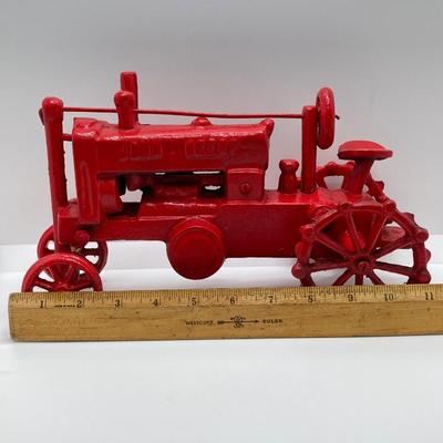 LOT 92: Vintage Red John Deere Cast Iron Tractor