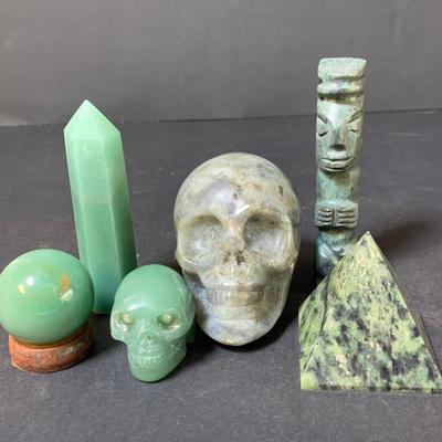 LOT 125: Polished Quartz Skulls. Pyramid and More
