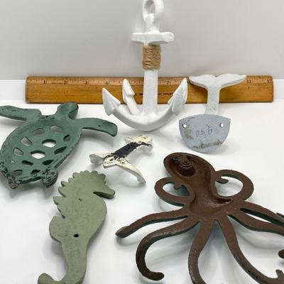 LOT 171: Decorative Cast Iron / Metal Wall Art - Nautical and Dragonflies